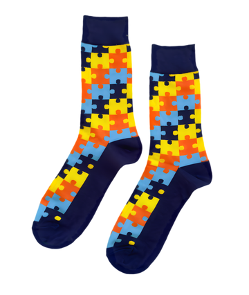 Funky Sunset Puzzle socks by ModSoles feature warm sunset hues and playful puzzle patterns for a vibrant and stylish look.