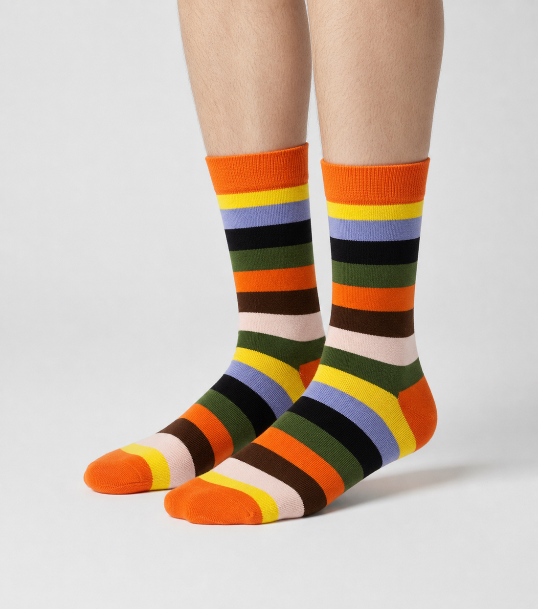 Amber Pine crew socks flat lay showing warm amber and earthy brown stripe detail