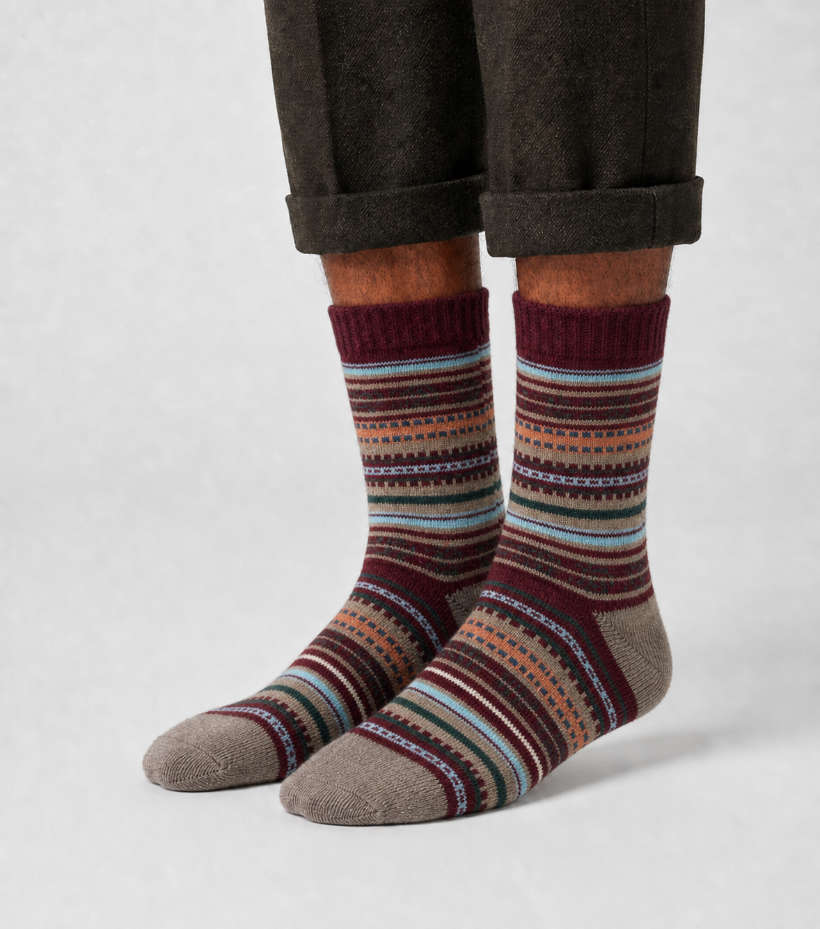 Chestnut Loom socks flat lay showing warm burgundy and tan autumn-tone wool-blend knit