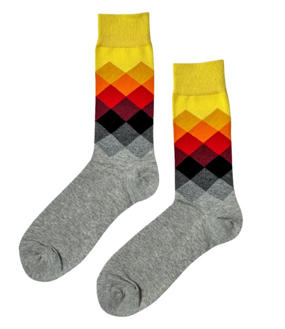 Prestige Citrine socks on white background showing full golden yellow color from cuff to toe