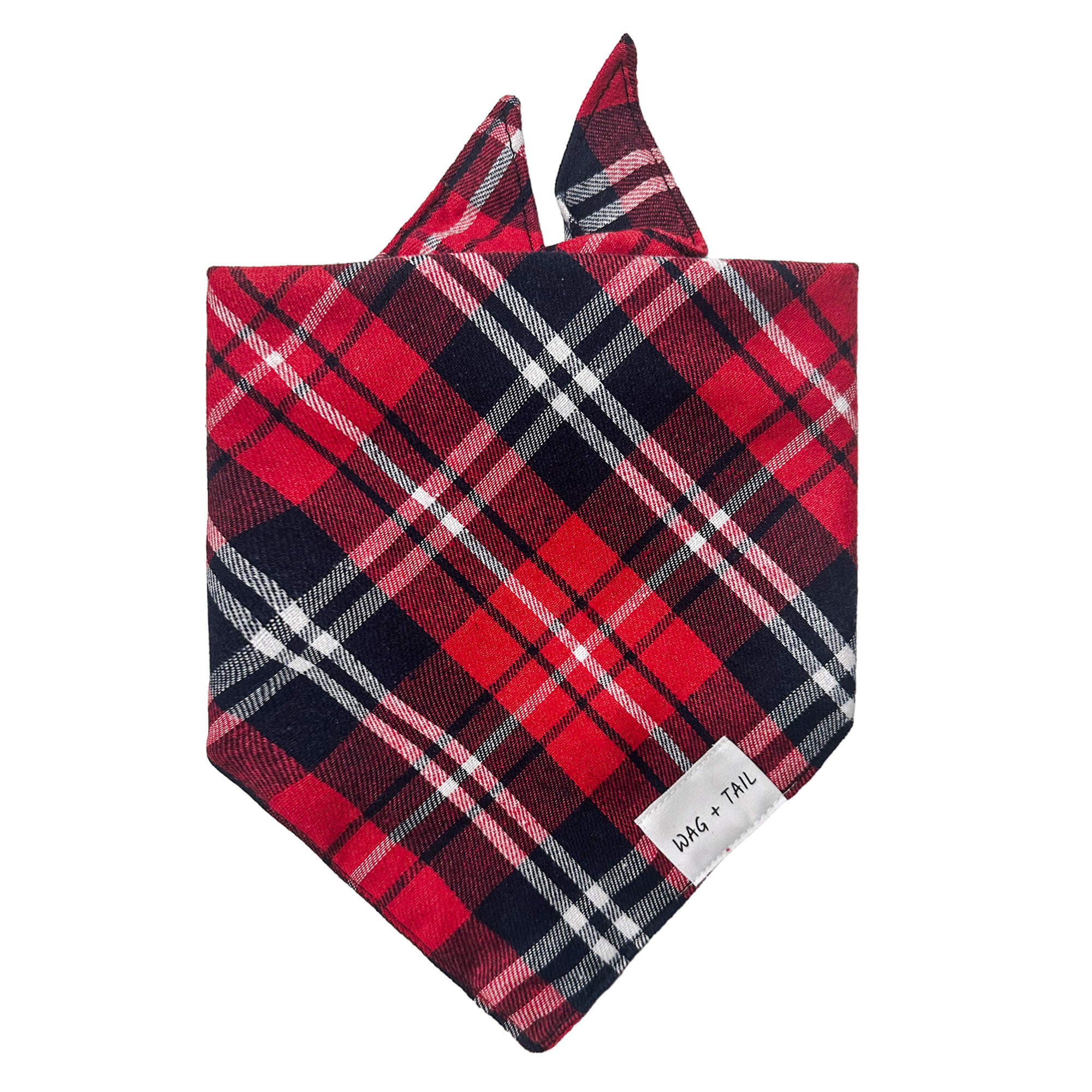Ruby Plaid dog bandana lifestyle shot showing deep red plaid tied on dog