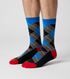Slate Fusion Argyle crew socks flat lay showing cool slate gray base with bright accent diamond pattern